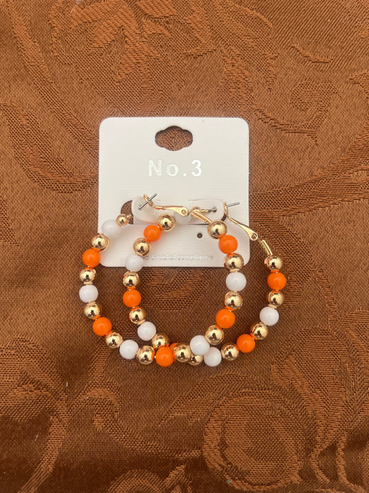 Orange and white ball hoops
