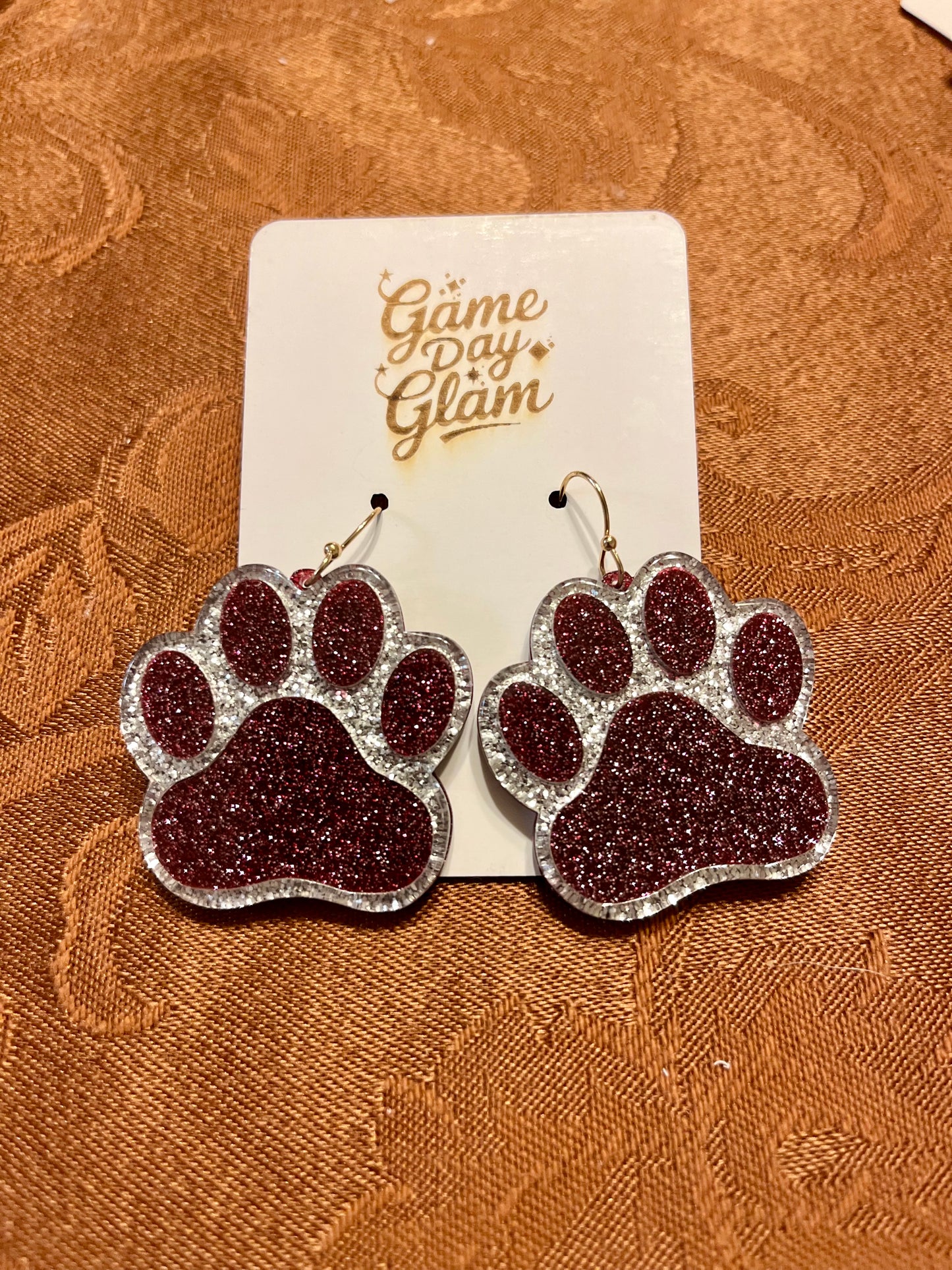 Maroon and silver pawprint dangles